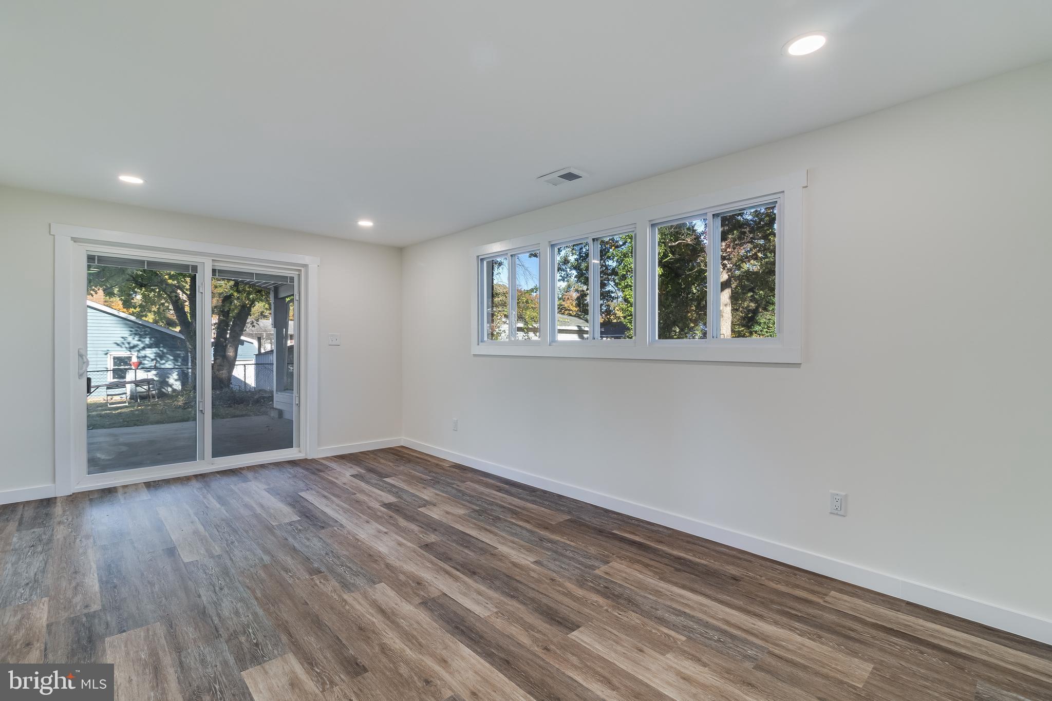 2804 Testway Avenue Fort Washington, MD 20744 - Photo 18 of 36 wooden floor in an empty room with a window
