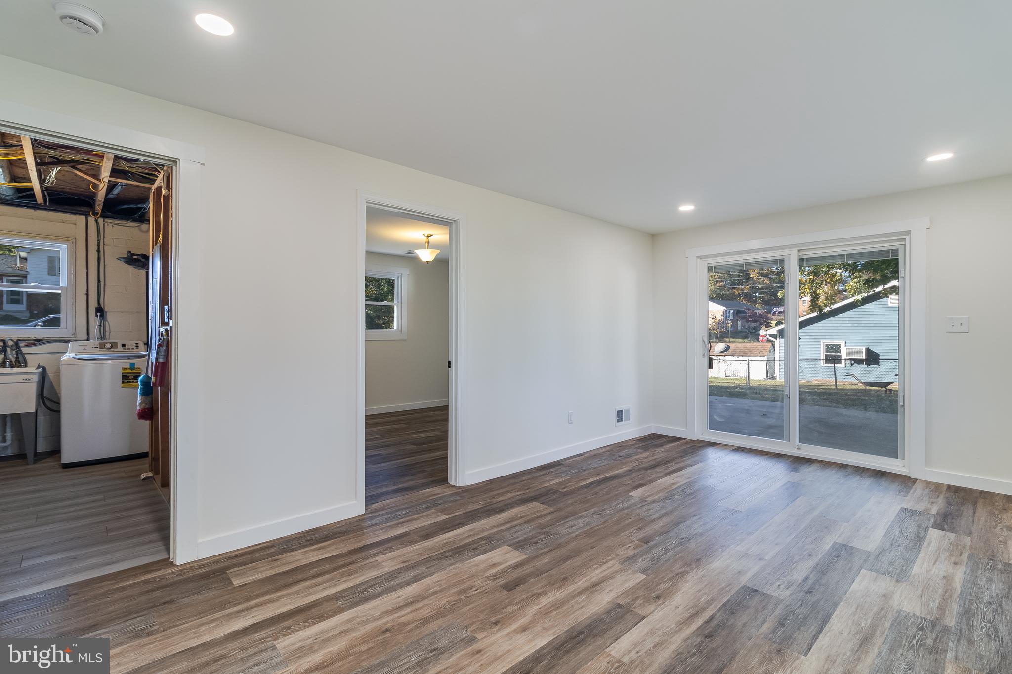 2804 Testway Avenue Fort Washington, MD 20744 - Photo 21 of 36 a view of a livingroom with wooden floor and a window