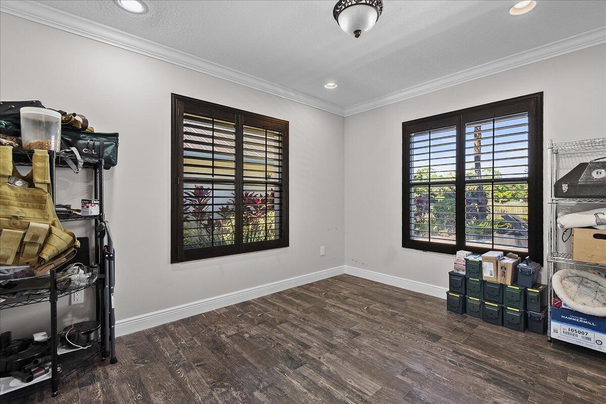 10975 Randolph Siding Road Jupiter, FL 33478 - Photo 48 of 97 a view of a livingroom with furniture and windows