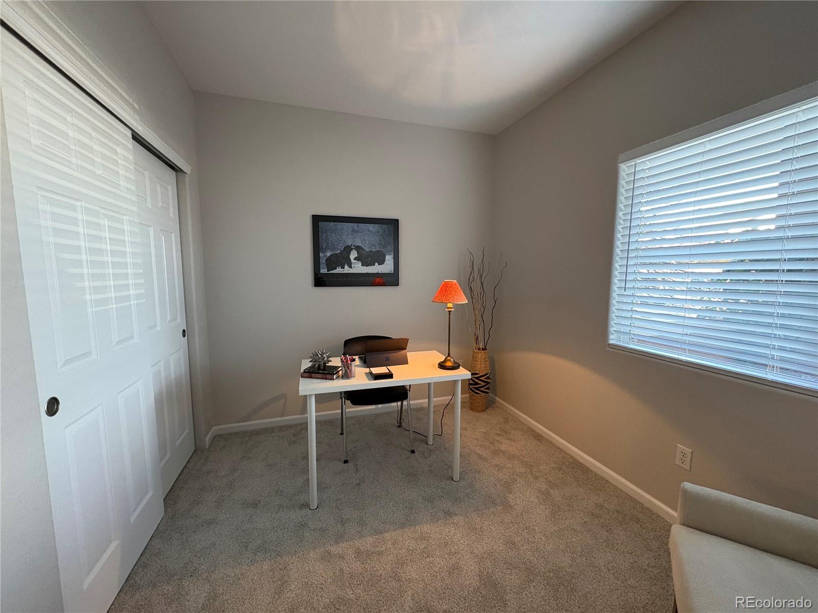 4608 Copeland Lane, Unit 101 Highlands Ranch, CO 80126 - Photo 13 of 16 a workspace with furniture and a window