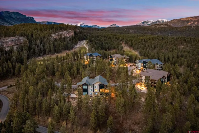 a front view of a building with glass windows