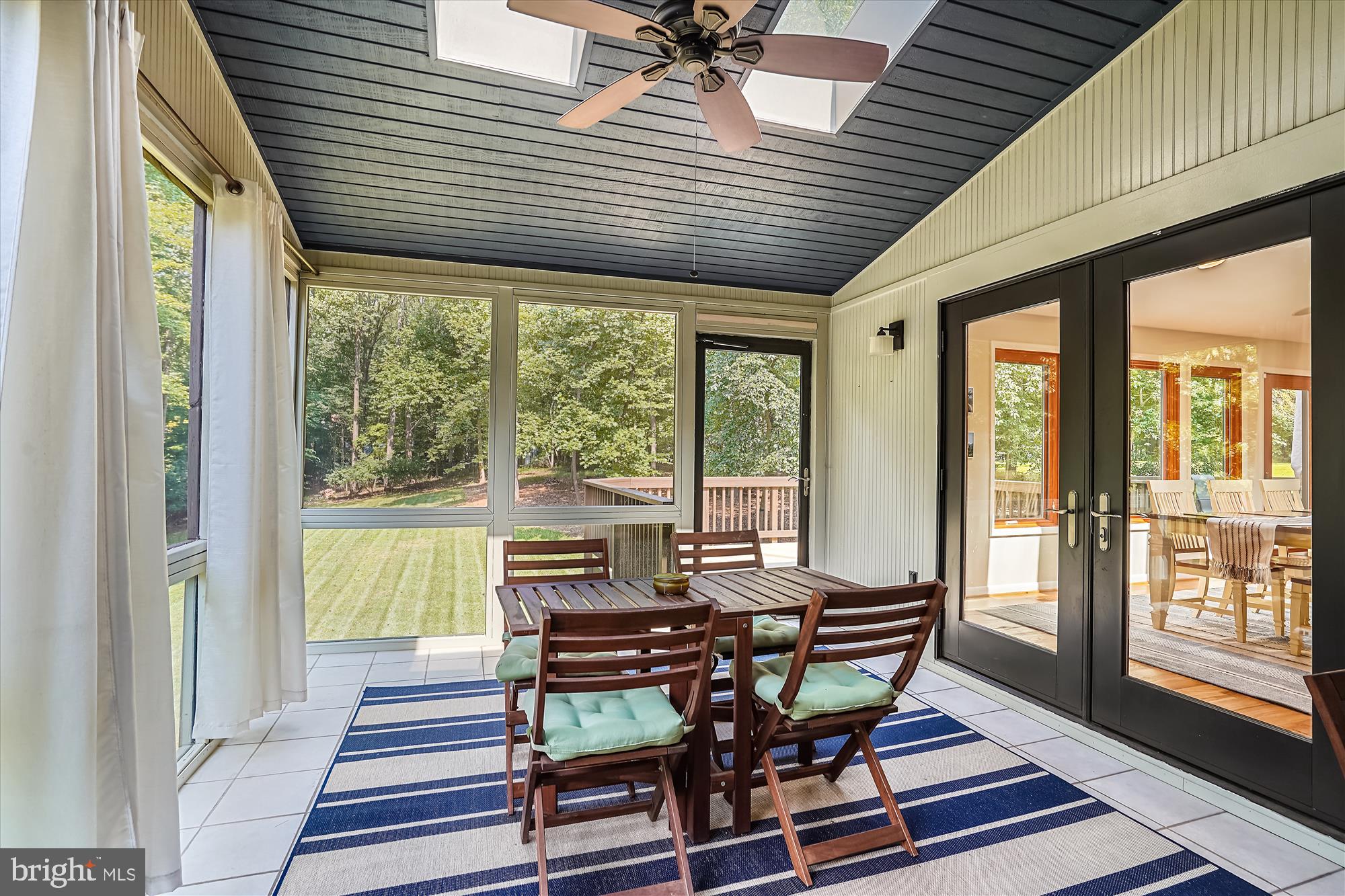 10408 Hunter Ridge Drive Oakton, VA 22124 - Photo 13 of 30 a dining room with furniture and large windows