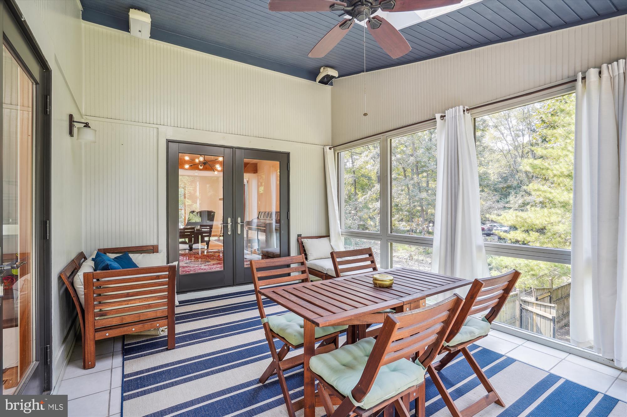 10408 Hunter Ridge Drive Oakton, VA 22124 - Photo 14 of 30 a dining room with furniture a chandelier and wooden floor