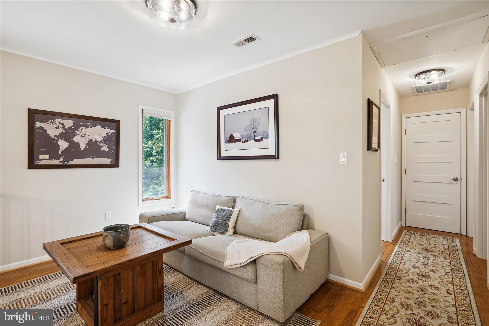 10408 Hunter Ridge Drive Oakton, VA 22124 - Photo 19 of 30 a living room with furniture and a rug