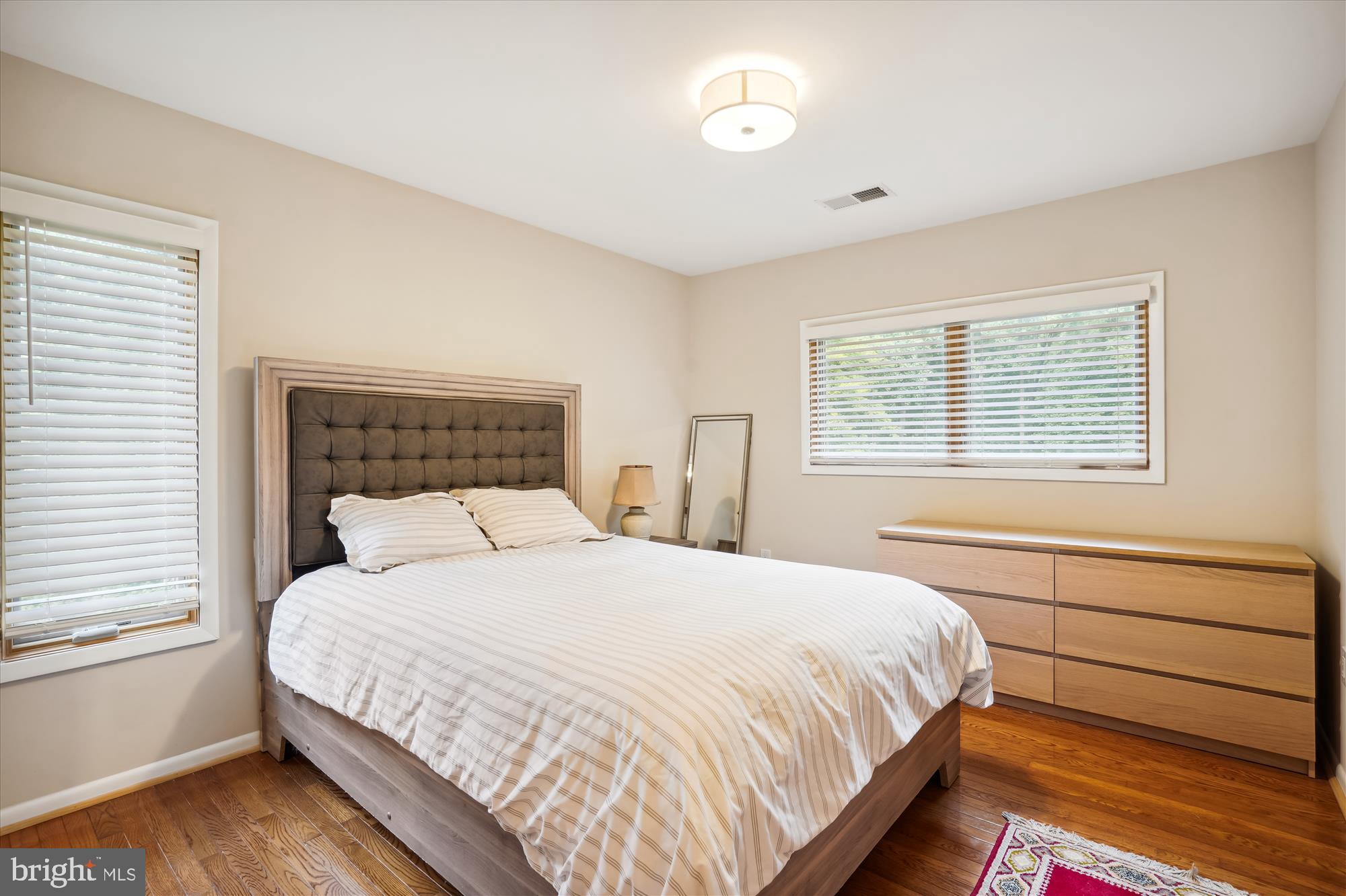 10408 Hunter Ridge Drive Oakton, VA 22124 - Photo 26 of 30 a bedroom with a large bed and a window