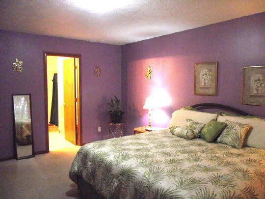 125 Pembroke Road Southwest Poplar Grove, IL 61065 - Photo 7 of 10 a bedroom with a bed and a window