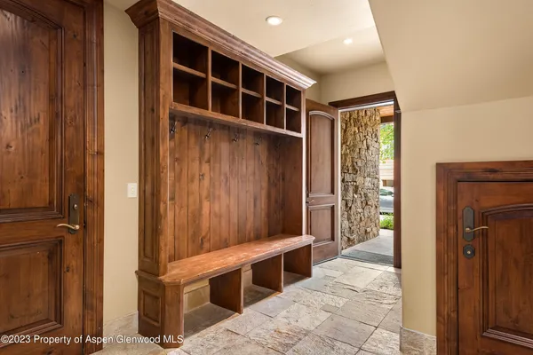a view of an entryway with wooden door