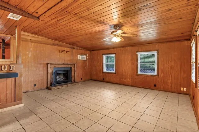 a view of empty room with windows