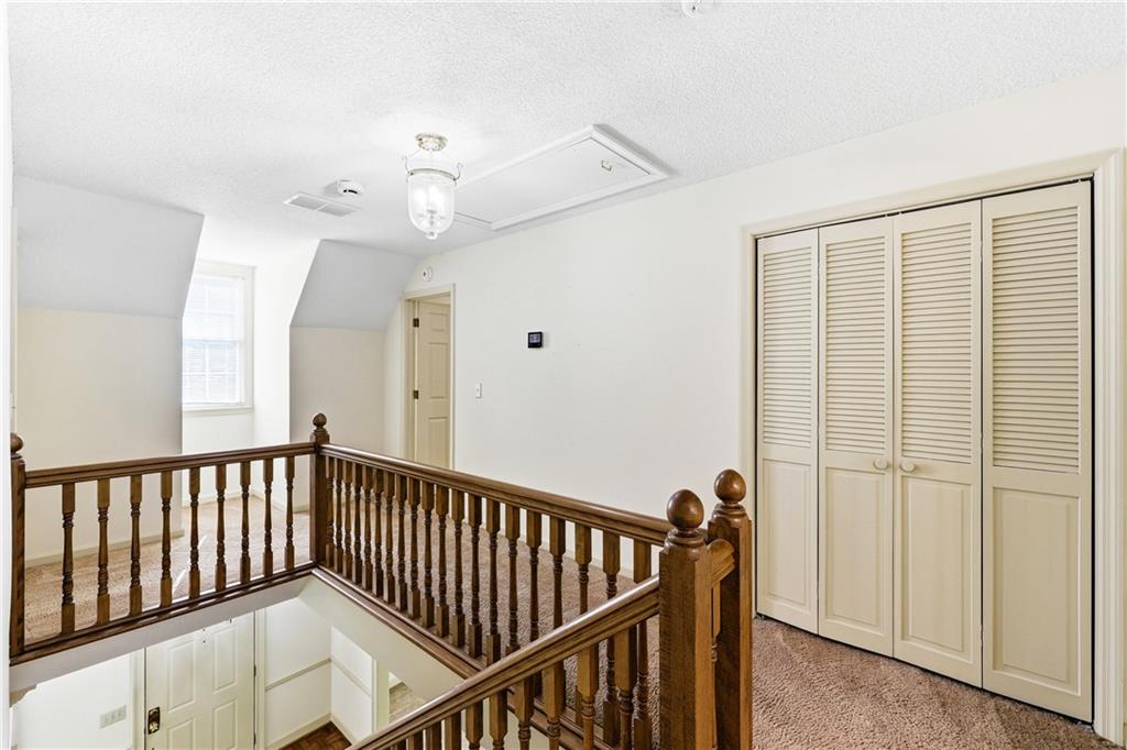 3608 Maple Forge Lane Gainesville, GA 30504 - Photo 22 of 45 a view of a hallway with windows
