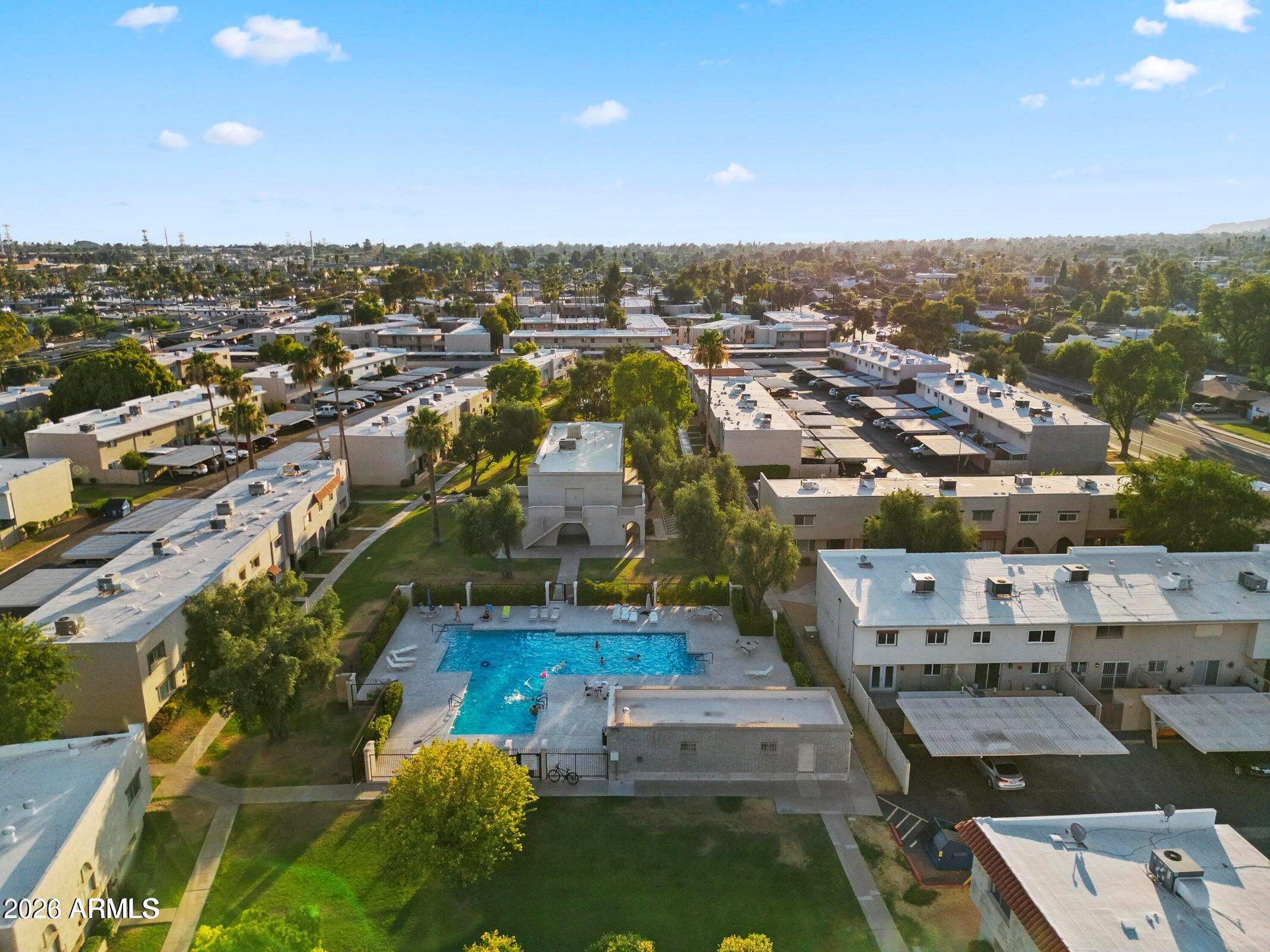 6909 East Osborn Road, Unit A Scottsdale, AZ 85251 - Photo 19 of 33 an aerial view of a house with a swimming pool