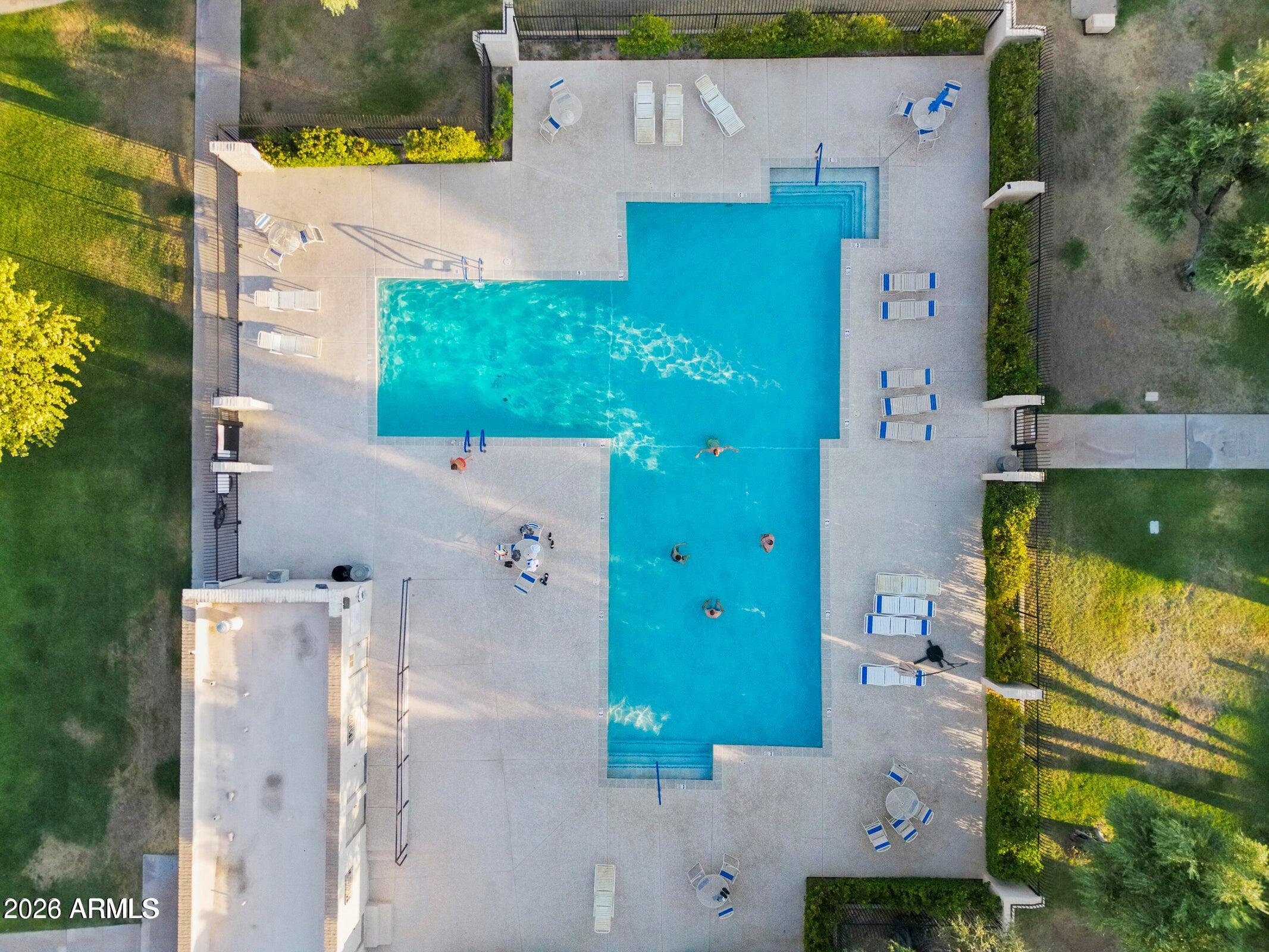 6909 East Osborn Road, Unit A Scottsdale, AZ 85251 - Photo 2 of 33 an aerial view of a house with a yard
