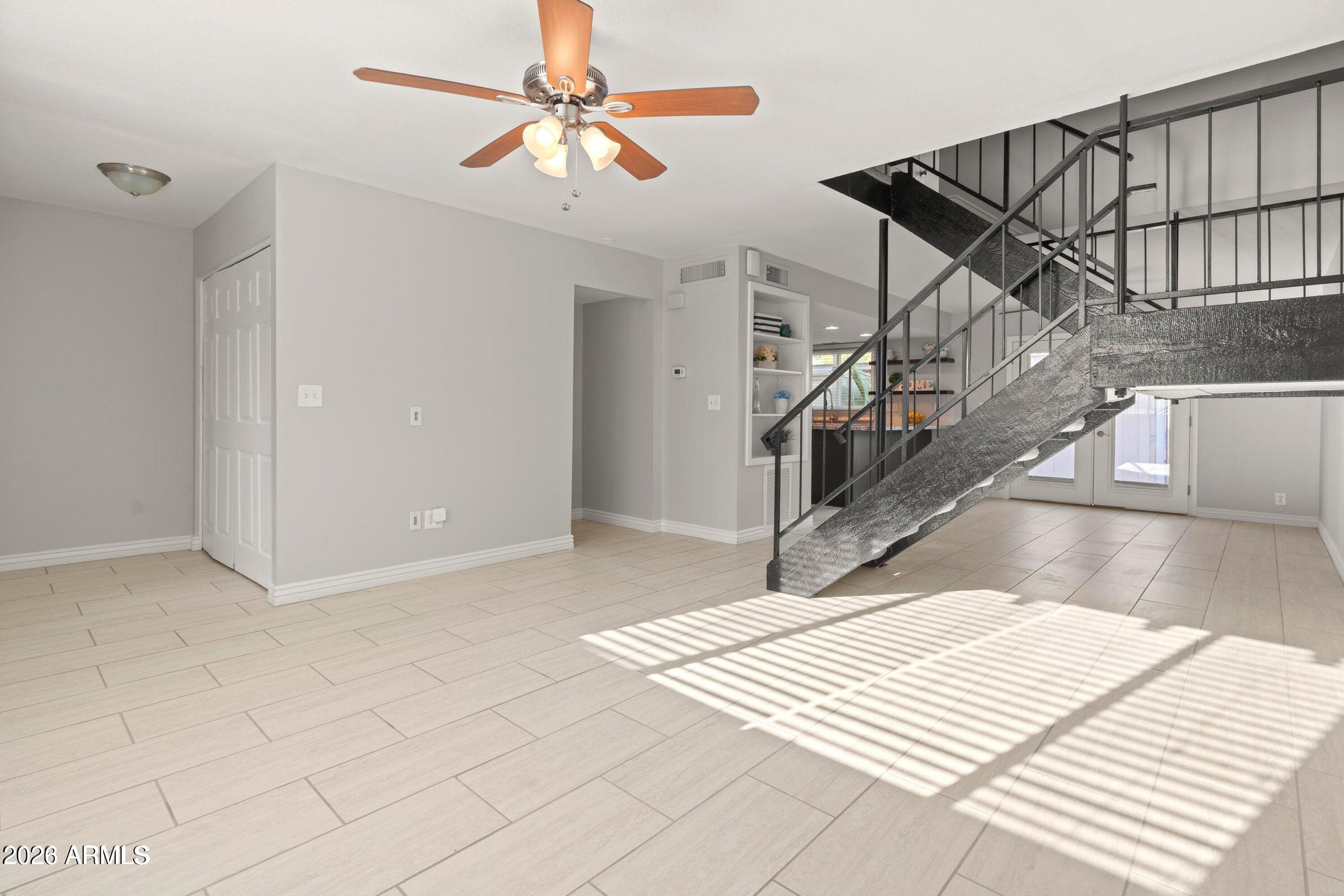 6909 East Osborn Road, Unit A Scottsdale, AZ 85251 - Photo 21 of 33 a view of entryway and hall with wooden floor