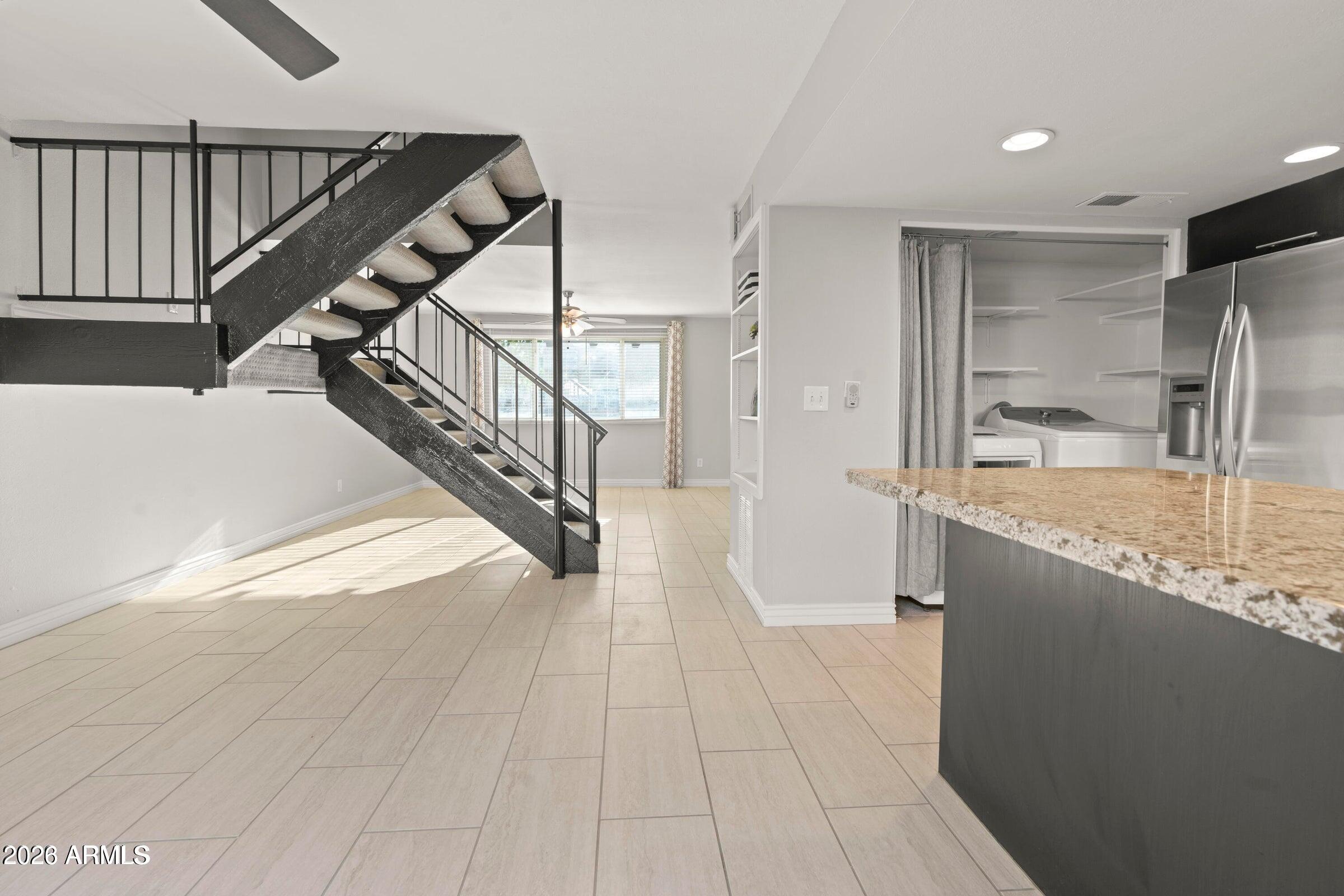 6909 East Osborn Road, Unit A Scottsdale, AZ 85251 - Photo 29 of 33 a view of a kitchen with kitchen and sink