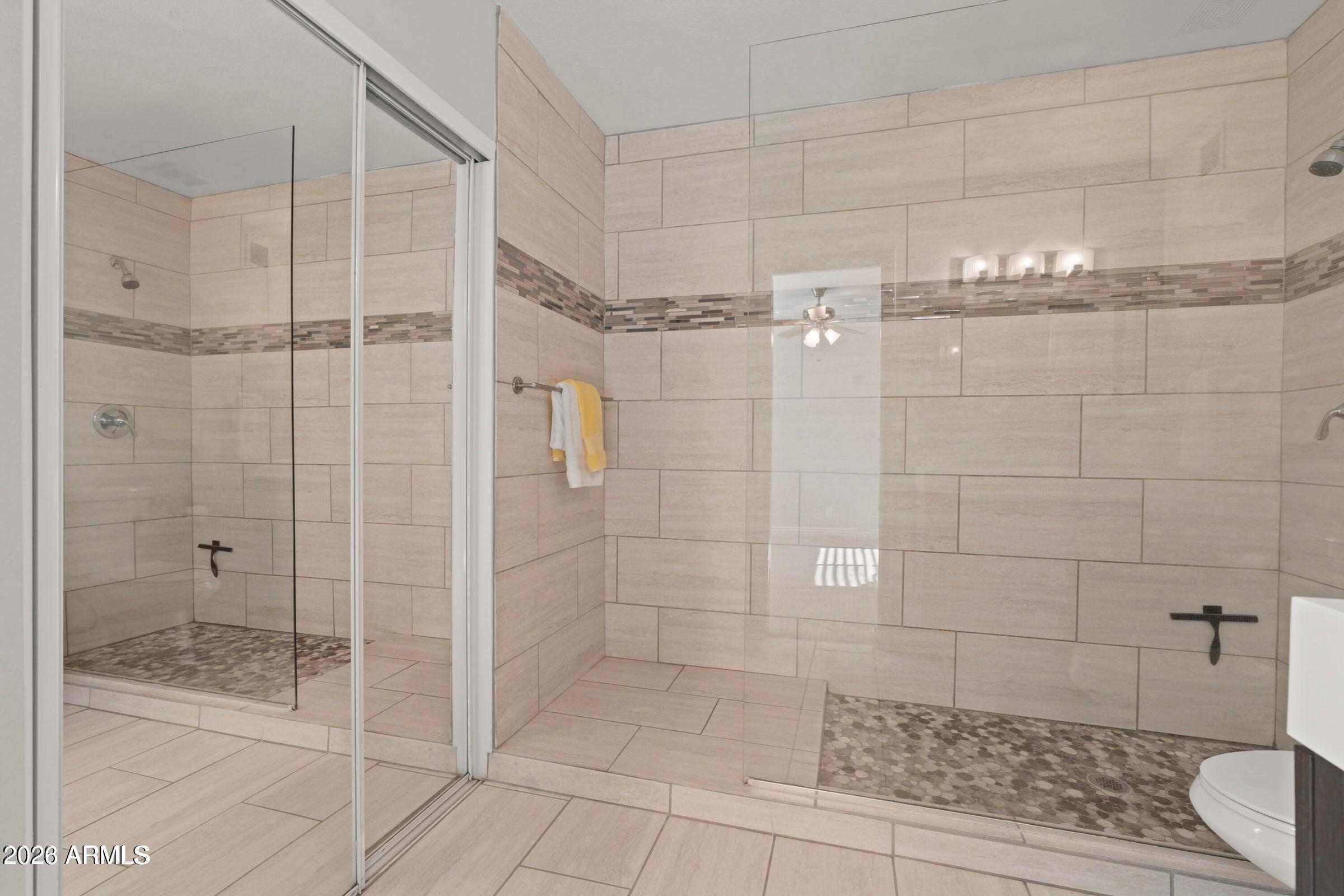 6909 East Osborn Road, Unit A Scottsdale, AZ 85251 - Photo 7 of 33 a bathroom with a shower