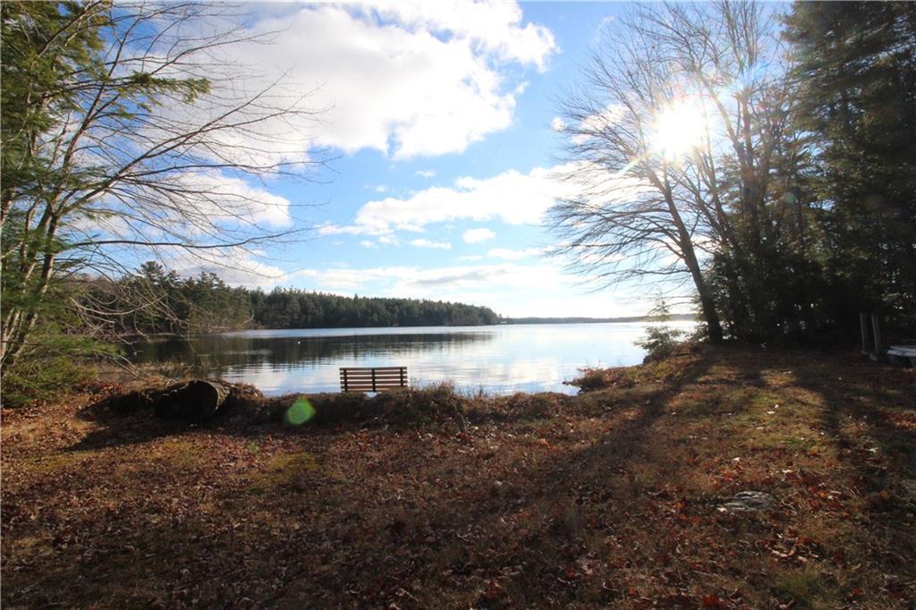 18 Pine Point Road Hope, ME 04847 - Photo 3 of 35 Beach and dock on Alford Lake is...