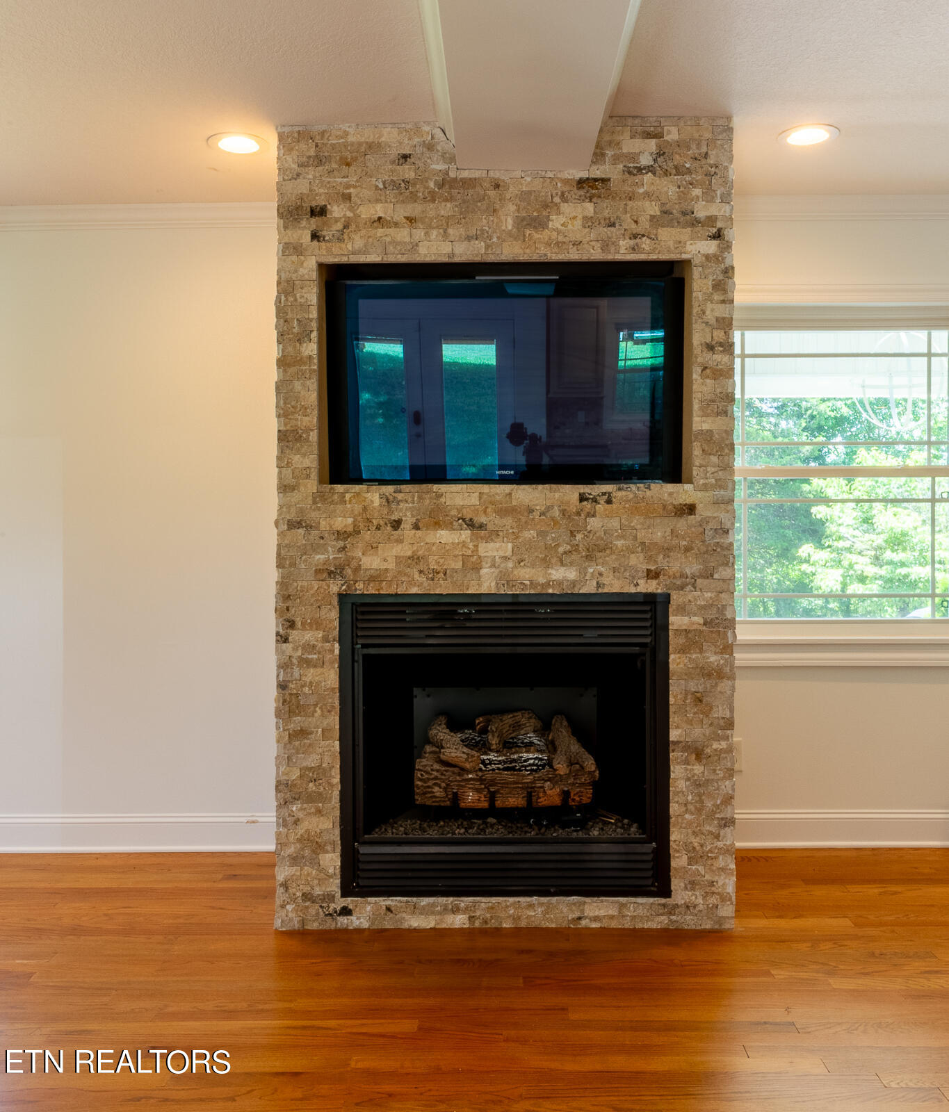 8732 Majors Road Knoxville, TN 37938 - Photo 18 of 34 Stone Fireplace w/ Built-In TV