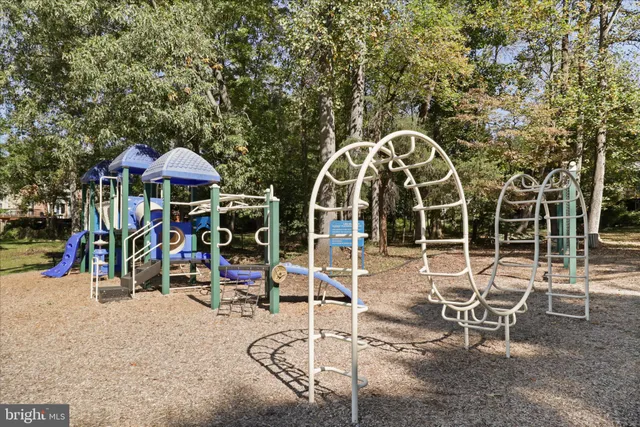 a view of a chairs and table in the patio