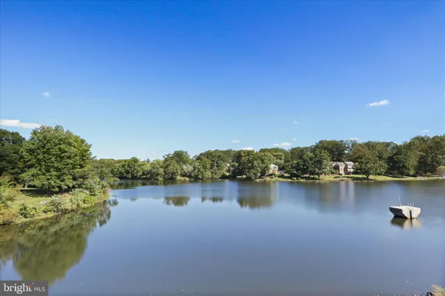 a view of a lake with houses