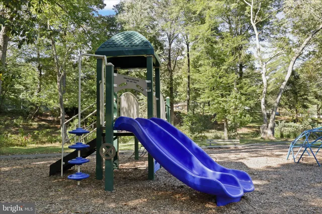 a view of roof with sitting area and entertaining space