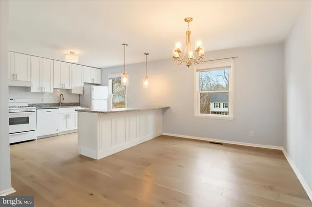 a view of a kitchen with marble kitchen and kitchen