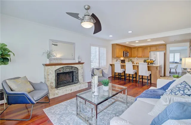 a bedroom with a bed and glass table