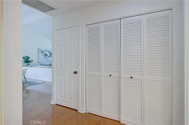 a view of a patio with a chairs and table in a patio