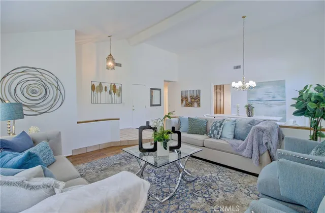 a living room with furniture and window