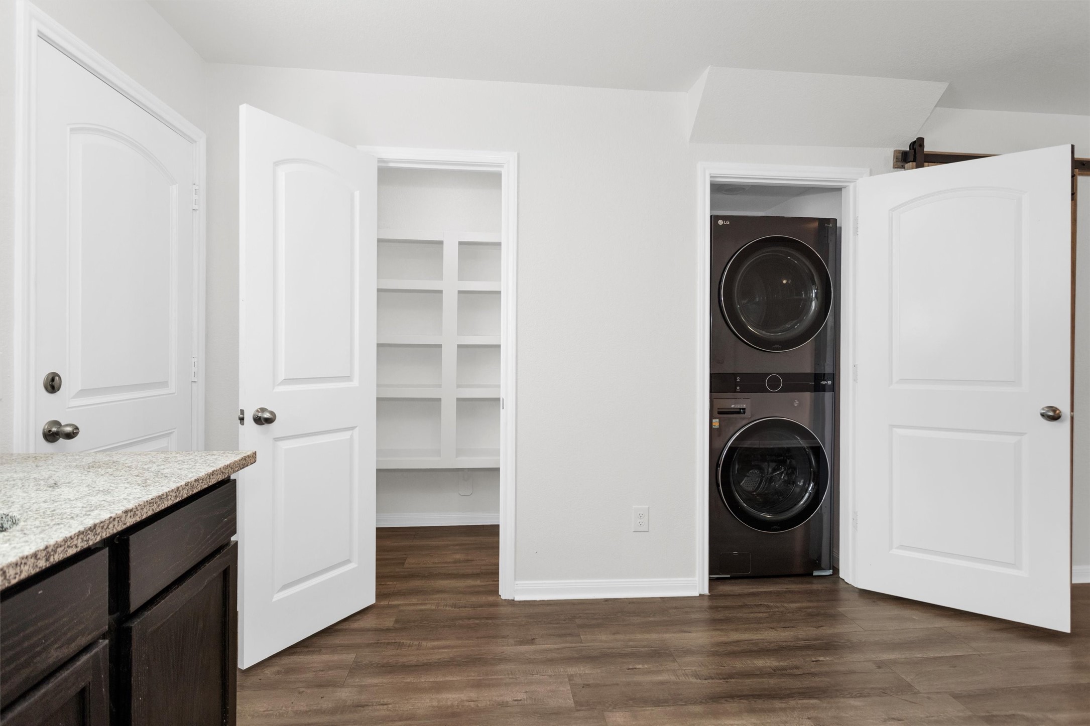 15134 Austin Road Willis, TX 77378 - Photo 9 of 20 a view of a storage & utility room with washer and dryer