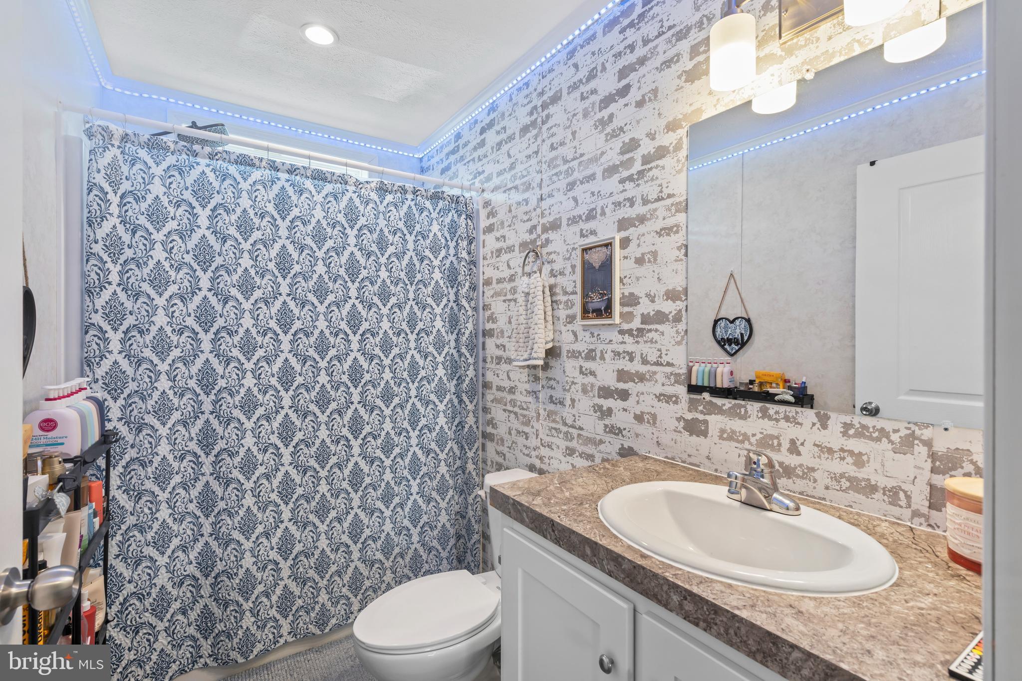 6 Southwind Circle Jackson, NJ 08527 - Photo 18 of 34 a bathroom with a sink toilet and shower