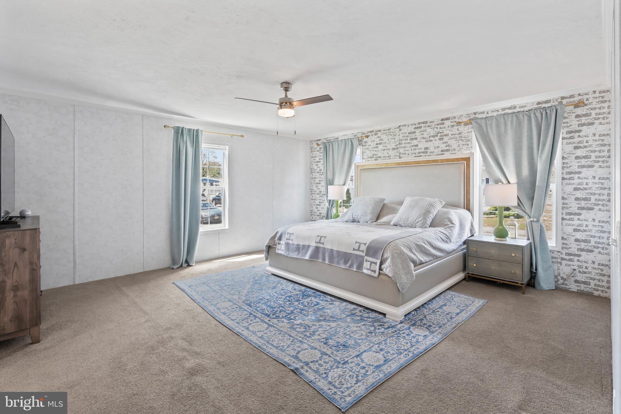 6 Southwind Circle Jackson, NJ 08527 - Photo 20 of 34 a bedroom with a bed and a couch