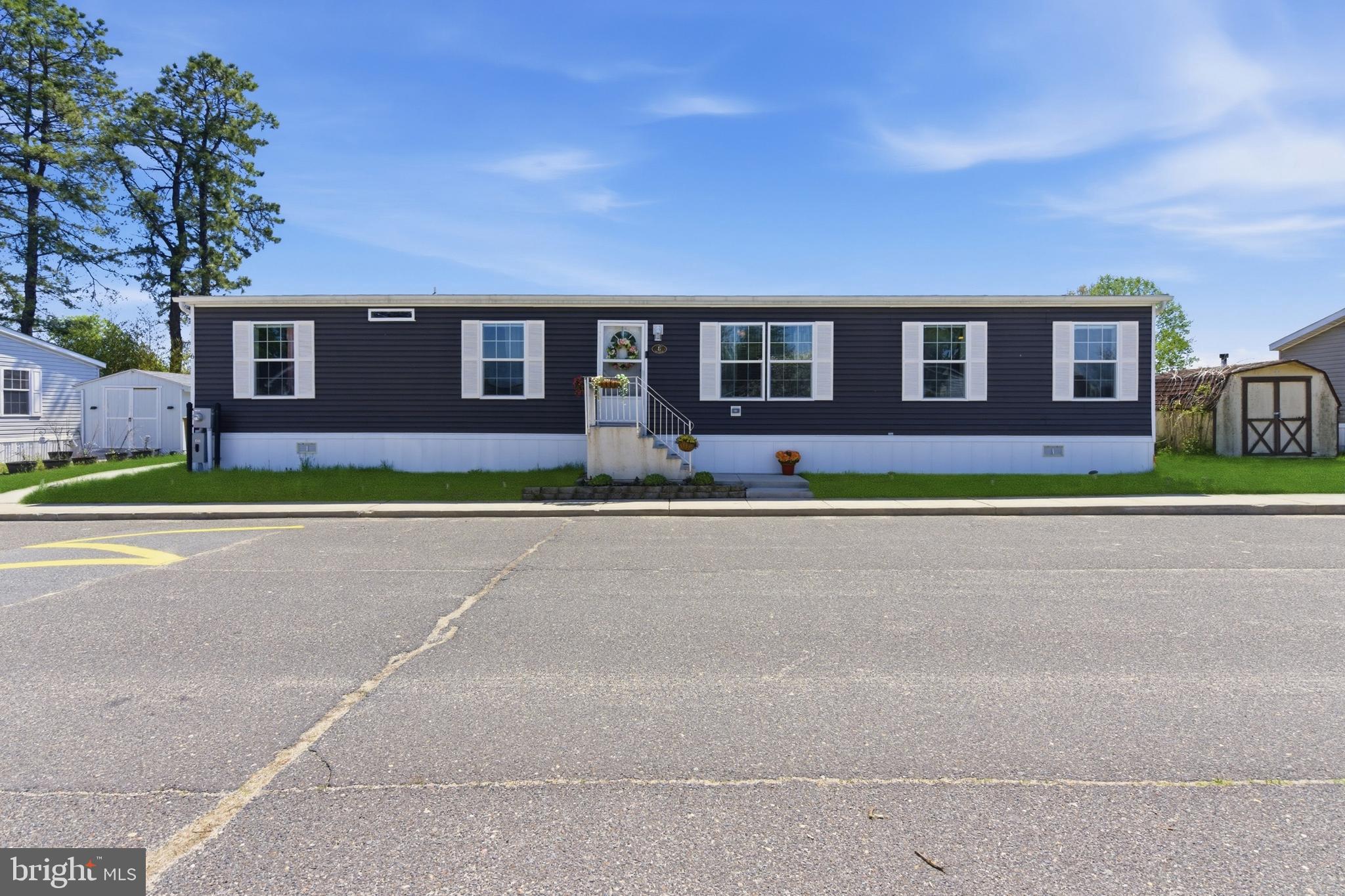 6 Southwind Circle Jackson, NJ 08527 - Photo 29 of 34 a front view of a house with a yard