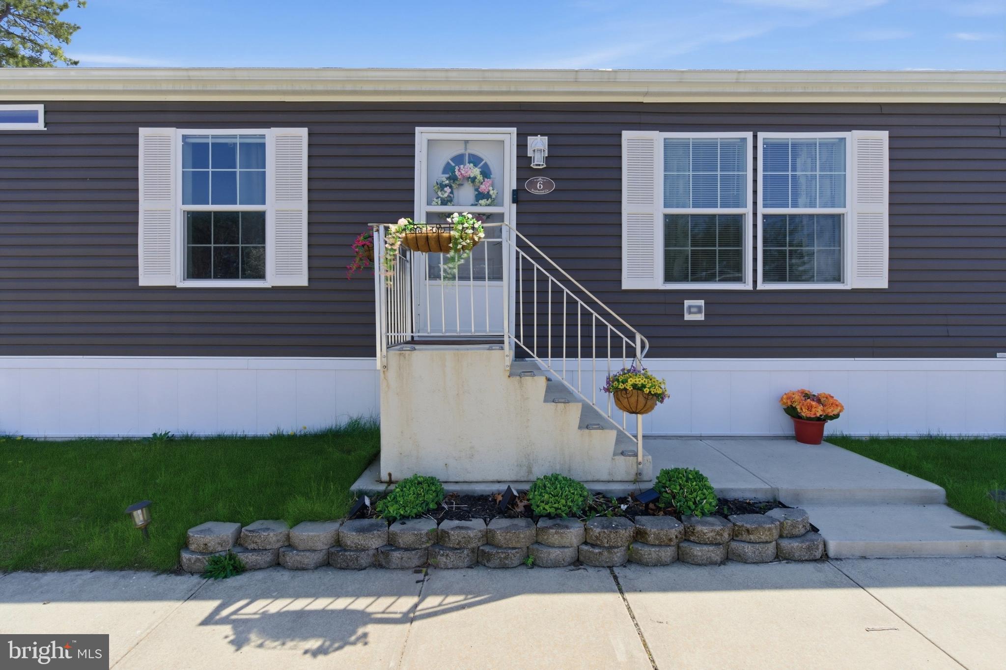 6 Southwind Circle Jackson, NJ 08527 - Photo 32 of 34 a front view of a house with patio