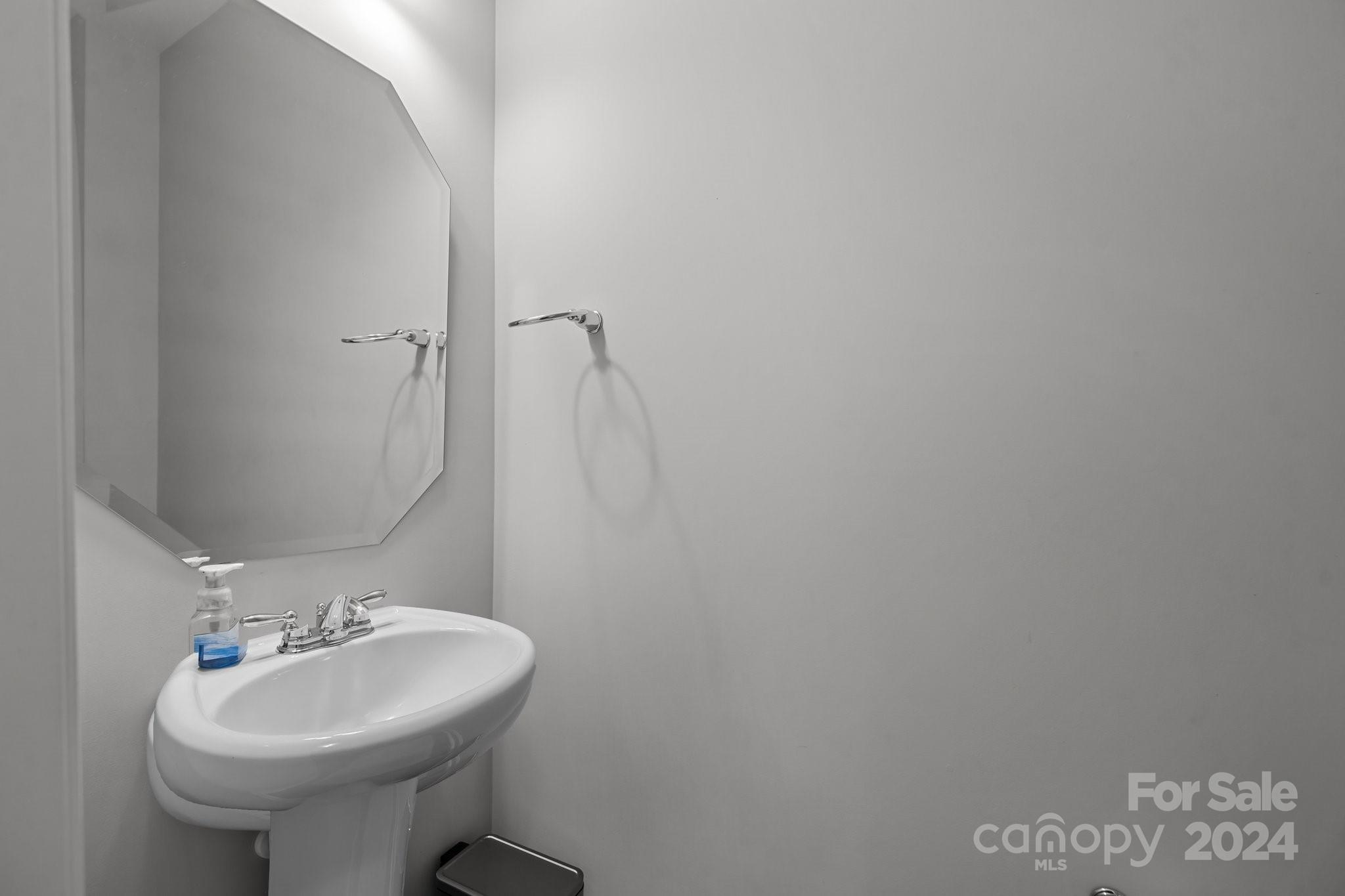 1152 Streamside Lane York, SC 29745 - Photo 17 of 47 a bathroom with a sink a toilet and mirror