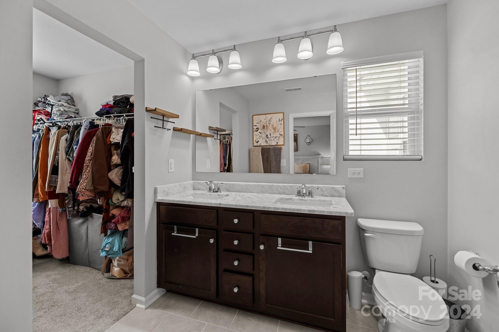 1152 Streamside Lane York, SC 29745 - Photo 28 of 47 a bathroom with a sink vanity and a mirror
