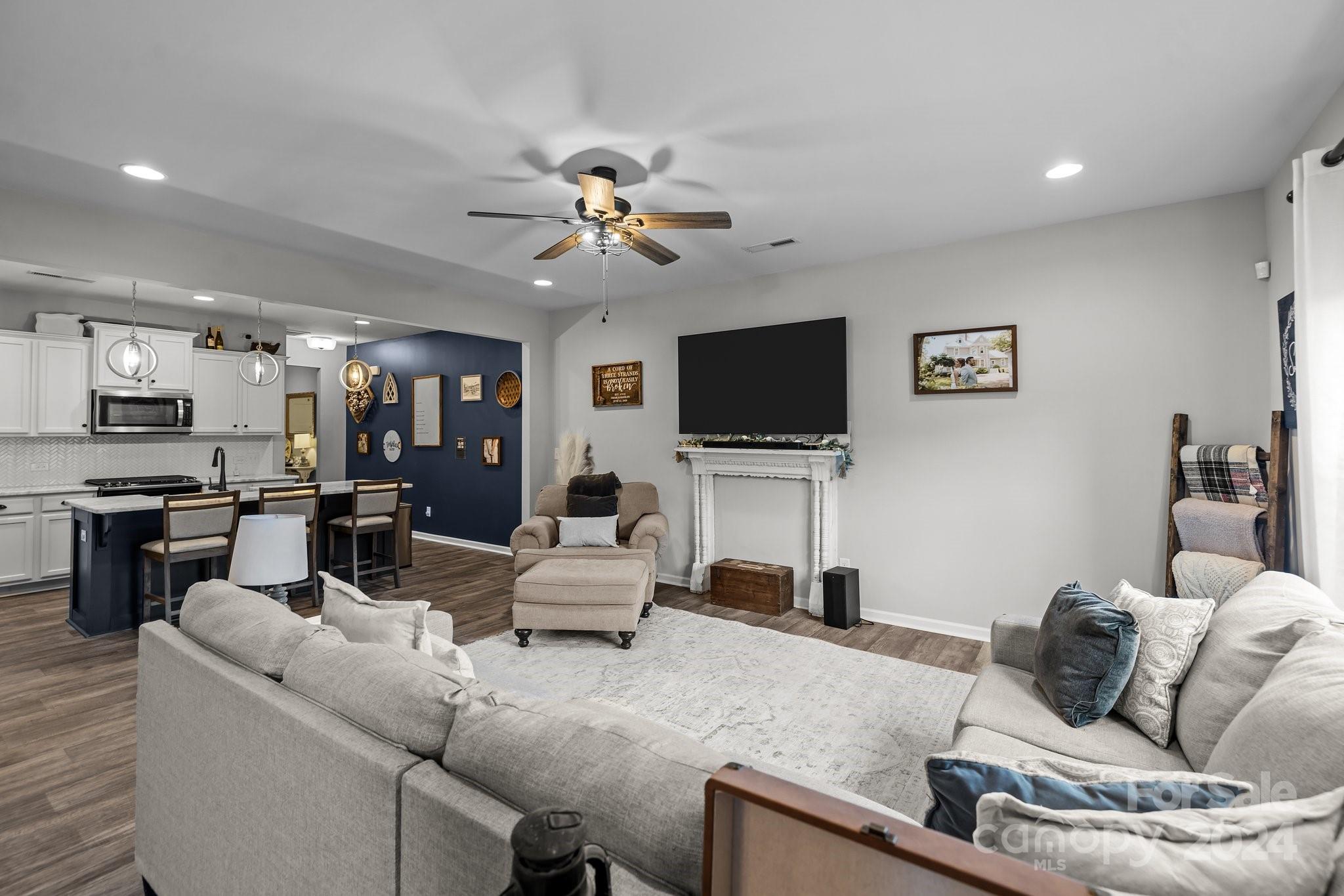 1152 Streamside Lane York, SC 29745 - Photo 10 of 47 a living room with furniture and a flat screen tv