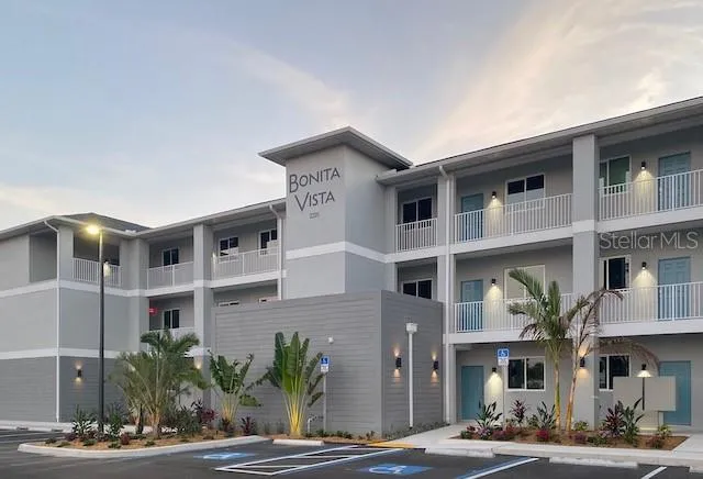 a front view of a building with street view