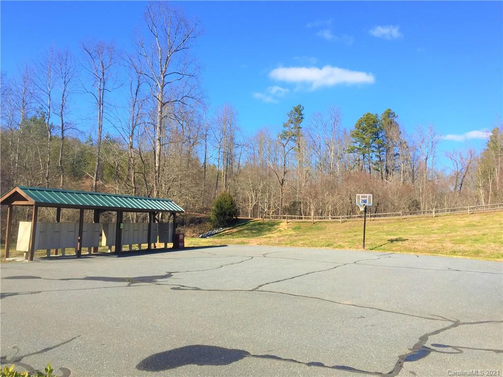 Lot#302 Bitterroot Circle Rutherfordton, NC 28139 - Photo 12 of 20 a view of a swimming pool with an outdoor space and seating area
