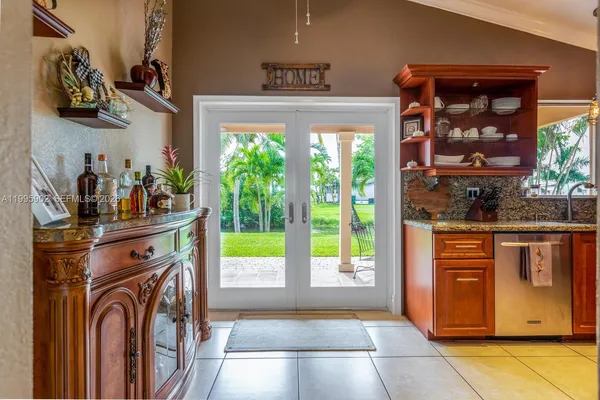 a view of a kitchen with food and a window
