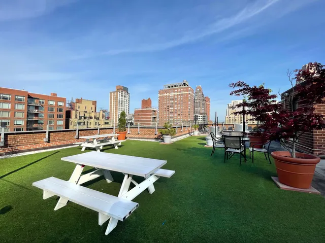 a view of a chairs in a park