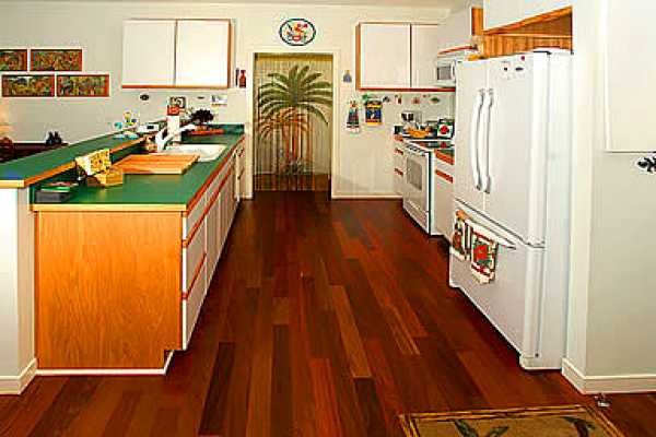 2211 D Pane Road Koloa, HI 96756 - Photo 4 of 12 a kitchen with stainless steel appliances granite countertop a refrigerator and a stove