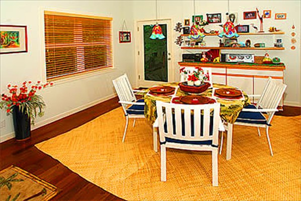 2211 D Pane Road Koloa, HI 96756 - Photo 6 of 12 a dining room filled with lots of furniture and a chandelier