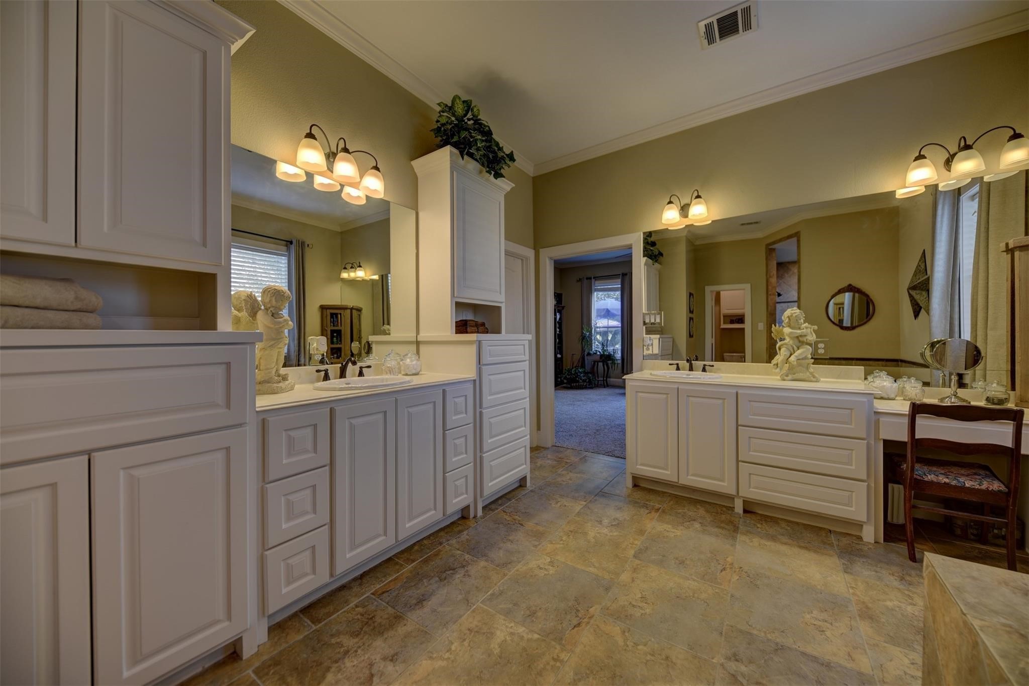 8456 Schuster Road Ledbetter, TX 78946 - Photo 22 of 49 a bathroom with a sink vanity and a mirror