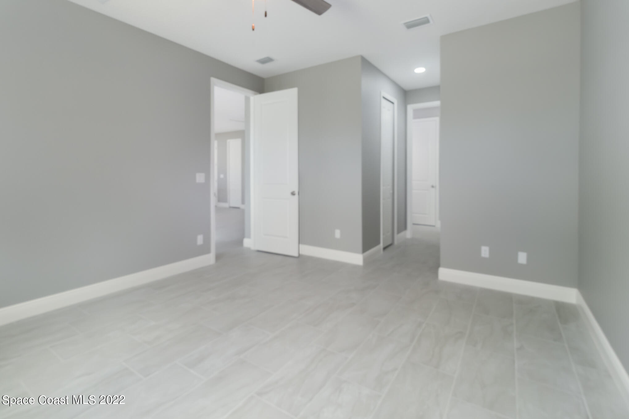 295 San Marino Road Southwest Palm Bay, FL 32908 - Photo 19 of 49 a view of an empty room