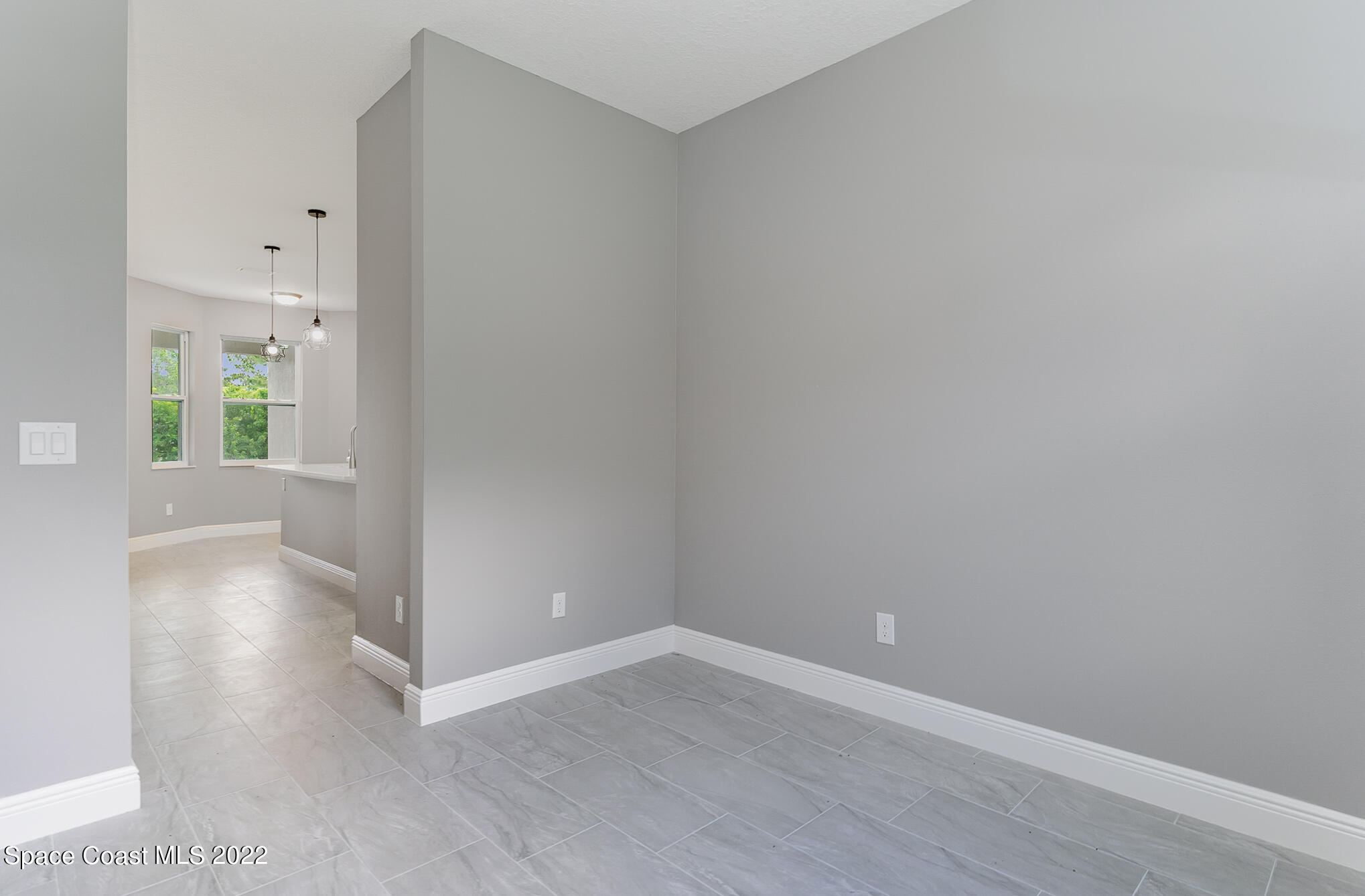 295 San Marino Road Southwest Palm Bay, FL 32908 - Photo 28 of 49 wooden floor in an empty room