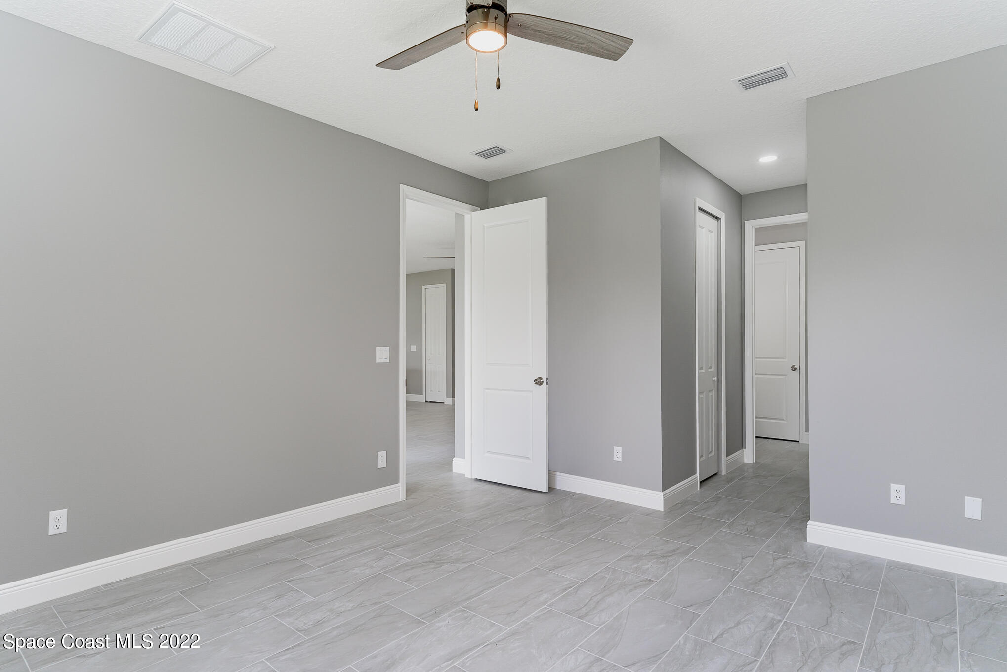 295 San Marino Road Southwest Palm Bay, FL 32908 - Photo 37 of 49 a view of an empty room