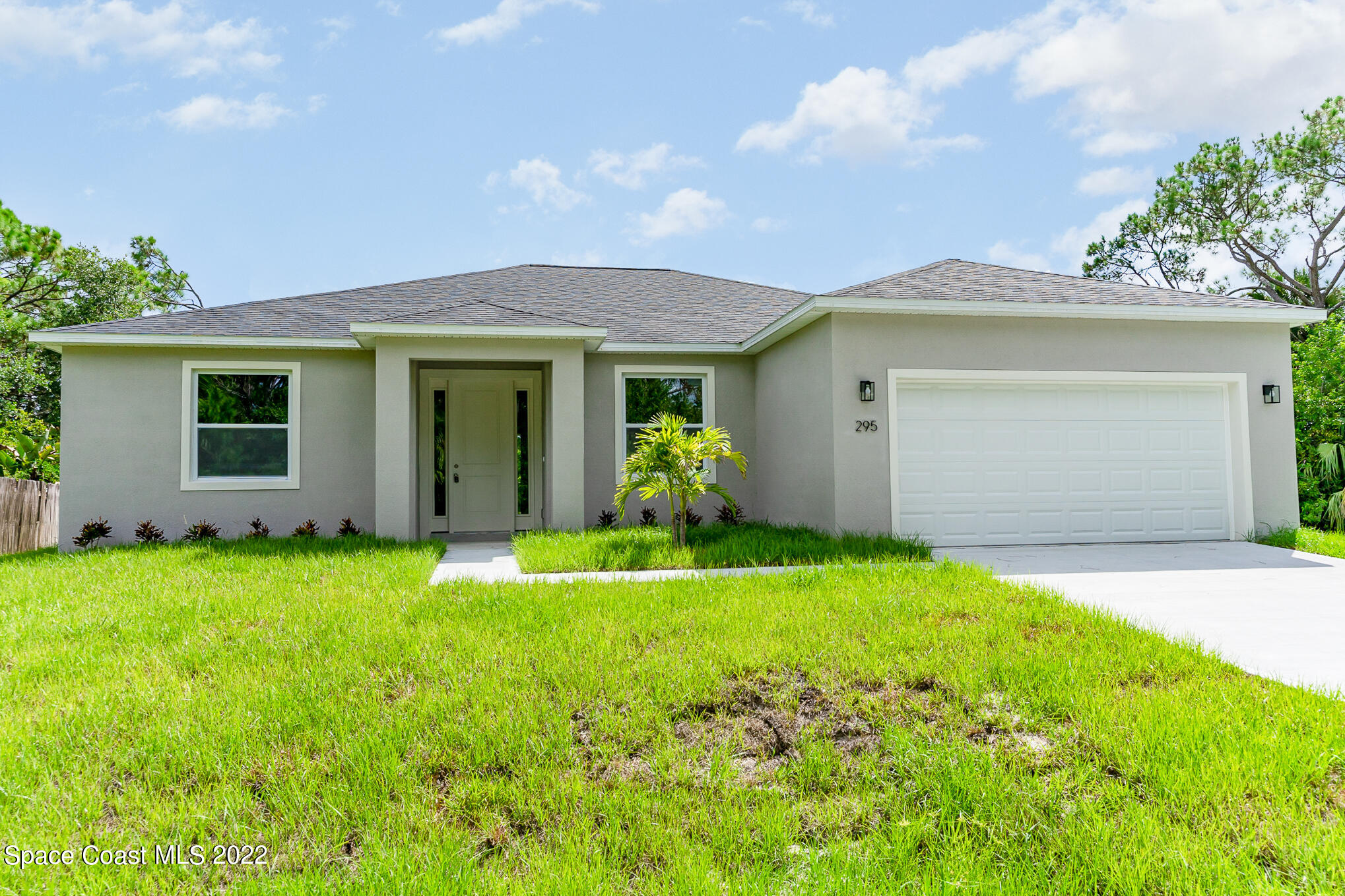295 San Marino Road Southwest Palm Bay, FL 32908 - Photo 47 of 49 a view of a house with yard and front view