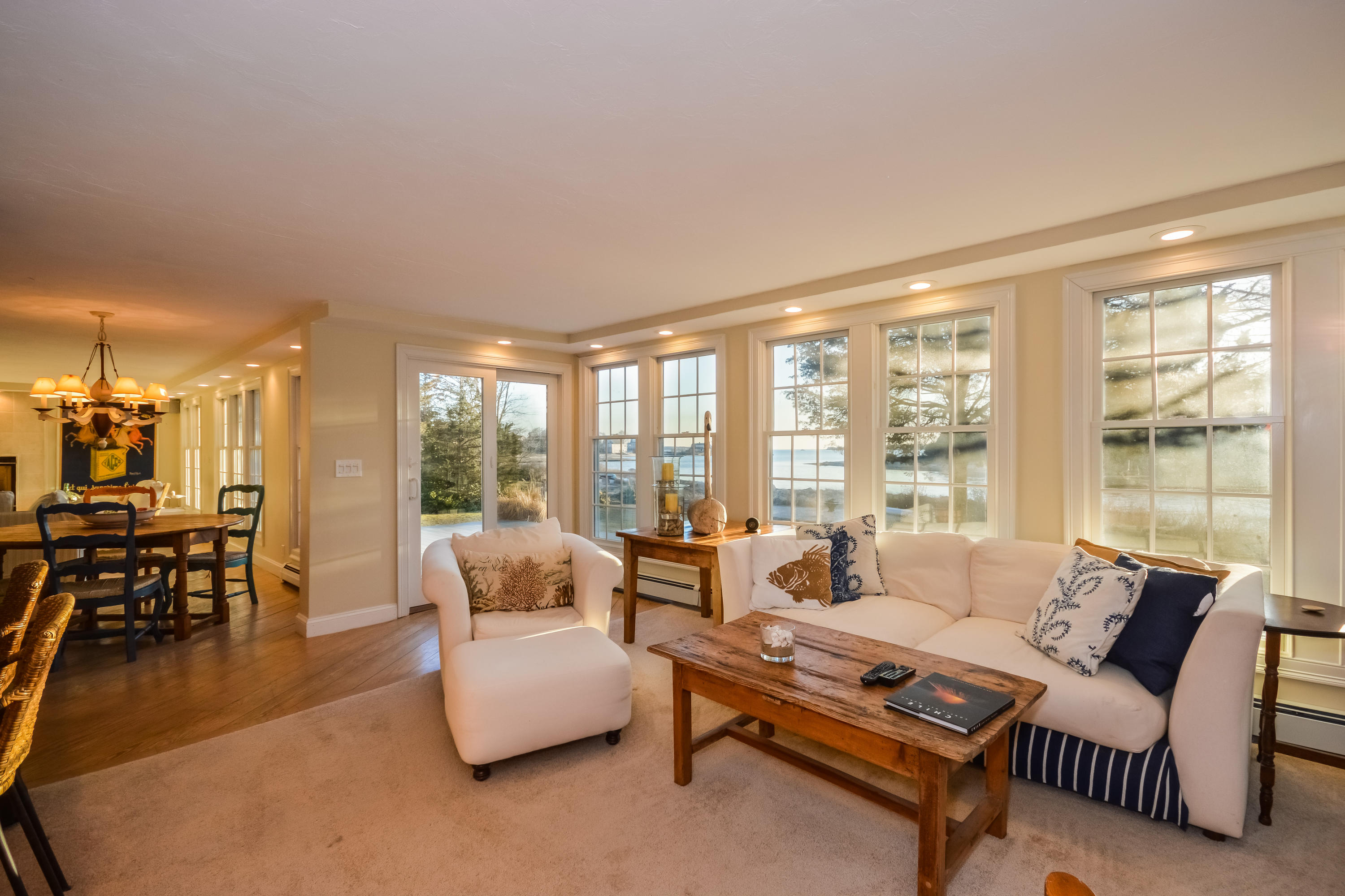 310 Shore Road Bourne, MA 02532 - Photo 15 of 31 a living room with furniture and a large window