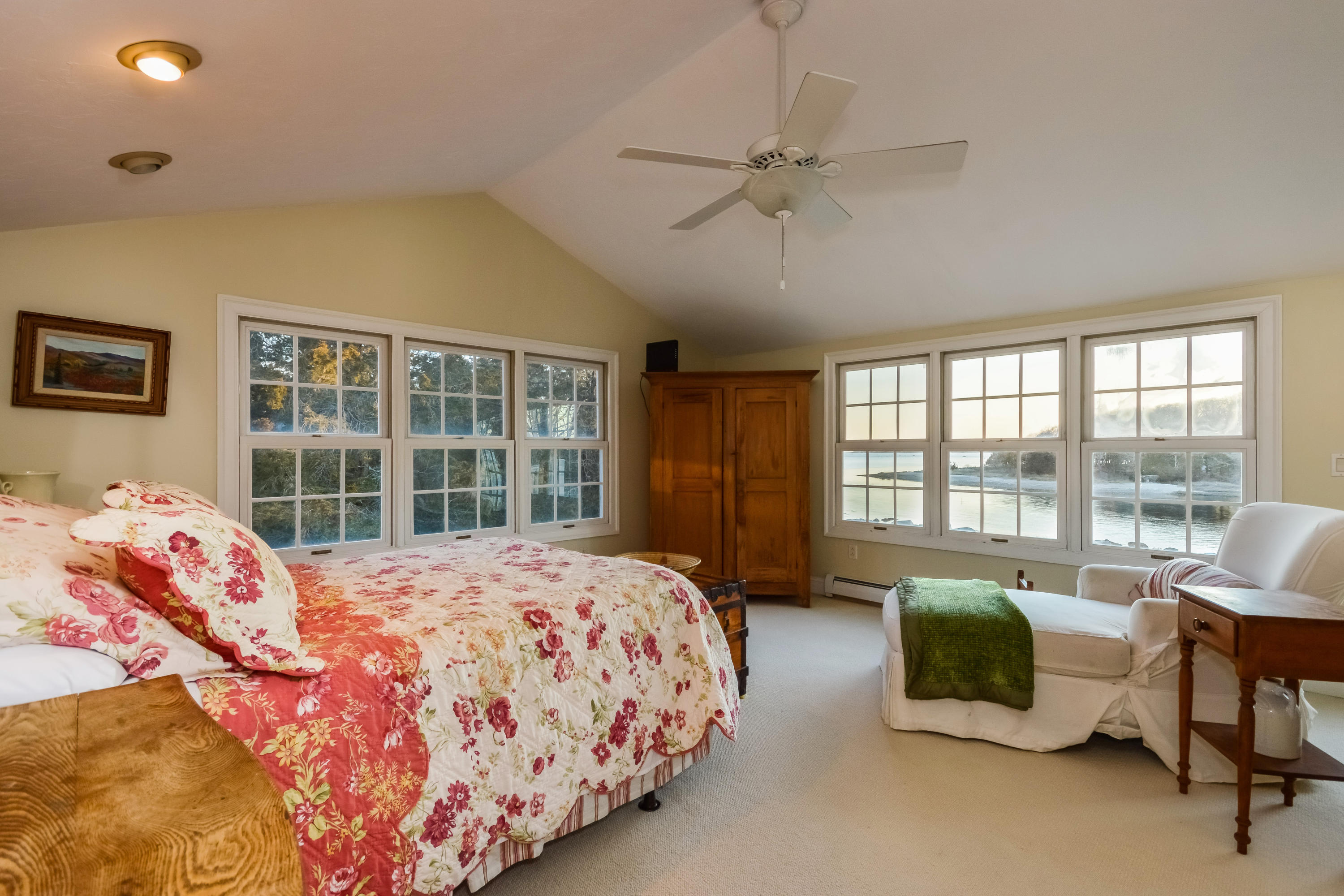 310 Shore Road Bourne, MA 02532 - Photo 18 of 31 a bedroom with a bed and a large window