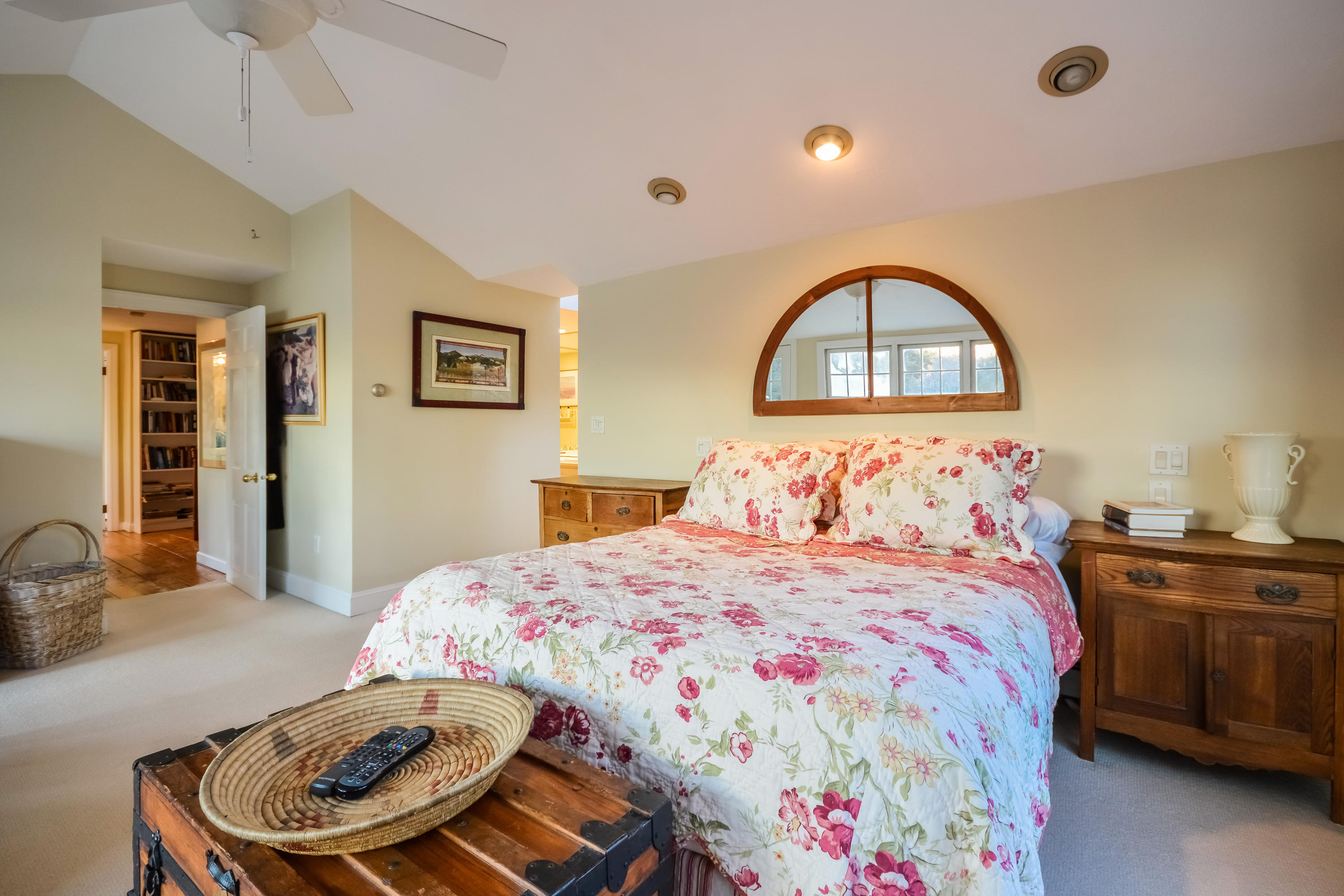 310 Shore Road Bourne, MA 02532 - Photo 20 of 31 a bedroom with a bed and a dresser