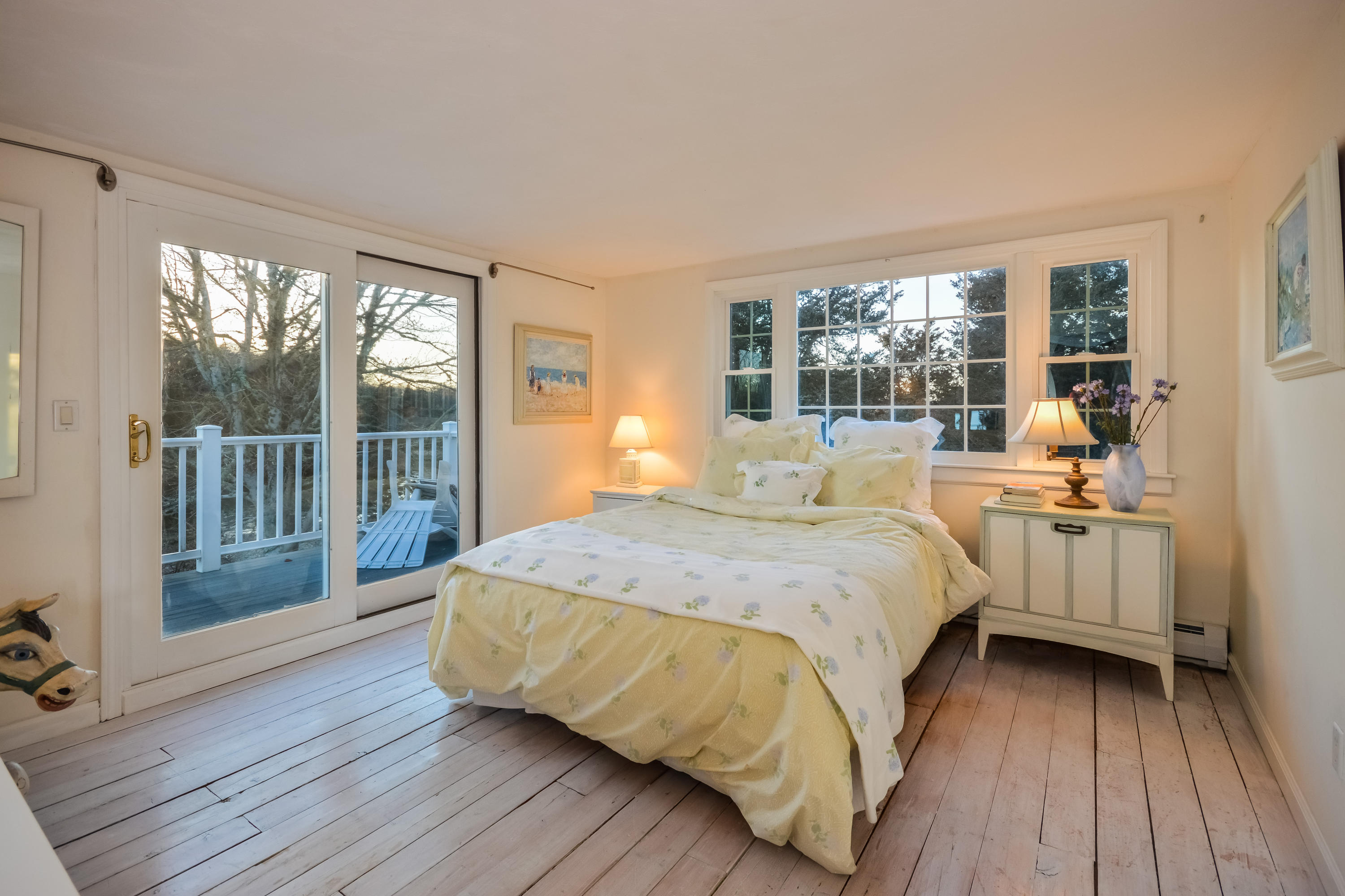 310 Shore Road Bourne, MA 02532 - Photo 21 of 31 a bedroom with a bed and a large window